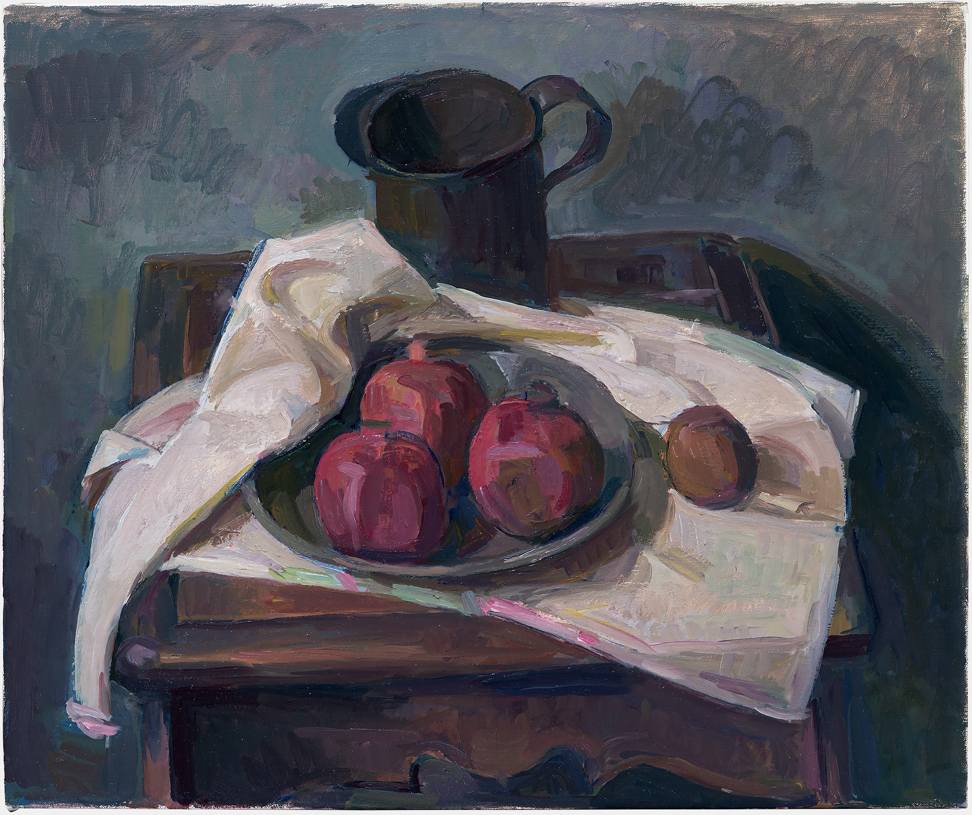 A still life painting featuring deep red pomegranates arranged in a dark bowl atop white draped fabric on a wooden table, with a dark pitcher visible in the background. The composition employs loose, expressive brushwork in muted earth tones and cool grays, creating a moody atmospheric quality around the vibrantly colored fruit.