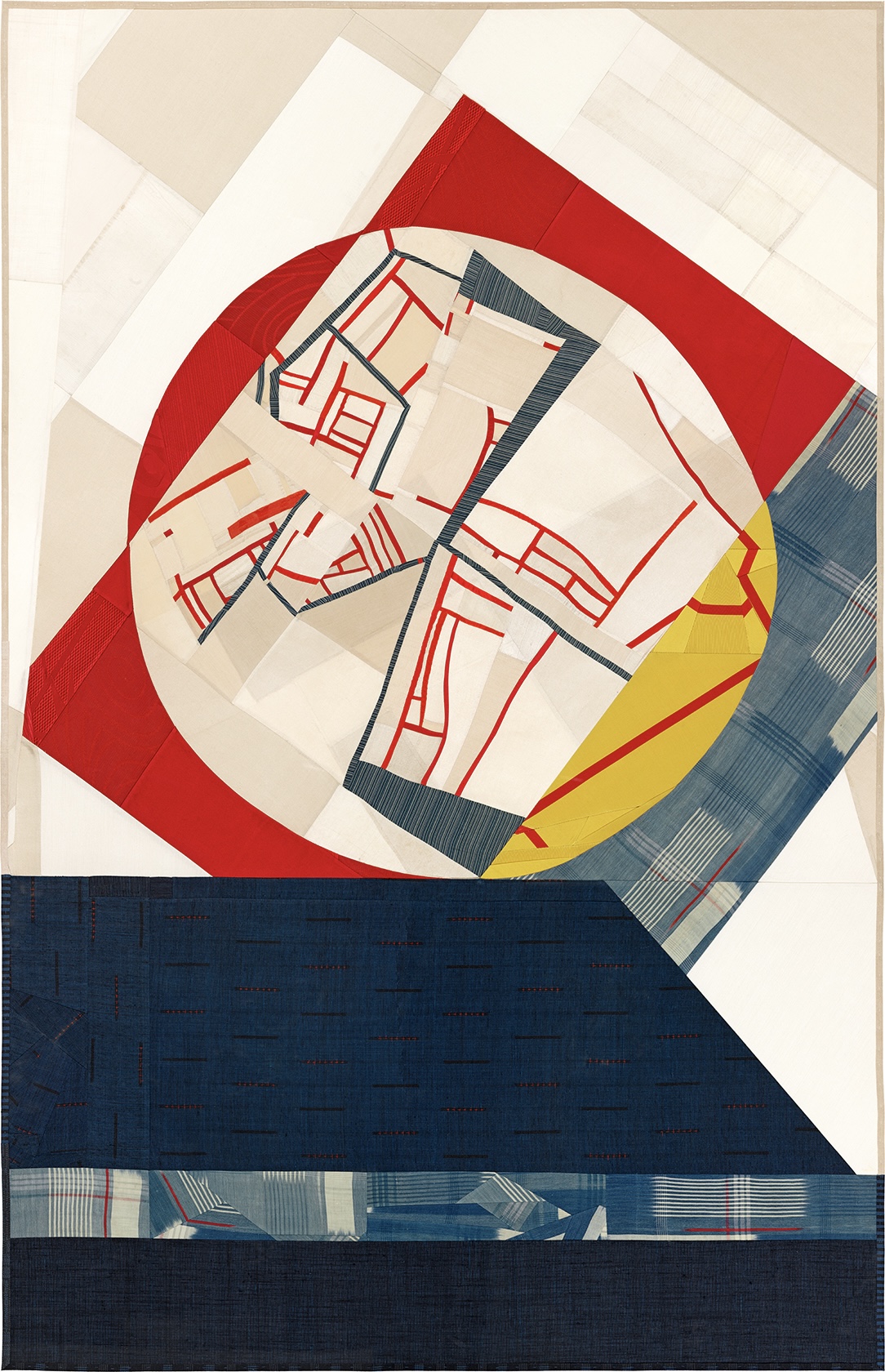 An abstract collage composition featuring a architectural floor plan rendered in red lines at the center, surrounded by concentric circles in red and yellow. The piece is constructed from pieced vintage silk fabrics in cream, navy blue, and gray tones, with visible textile textures and patterns throughout. The layered geometric elements create a sense of depth against the neutral background.