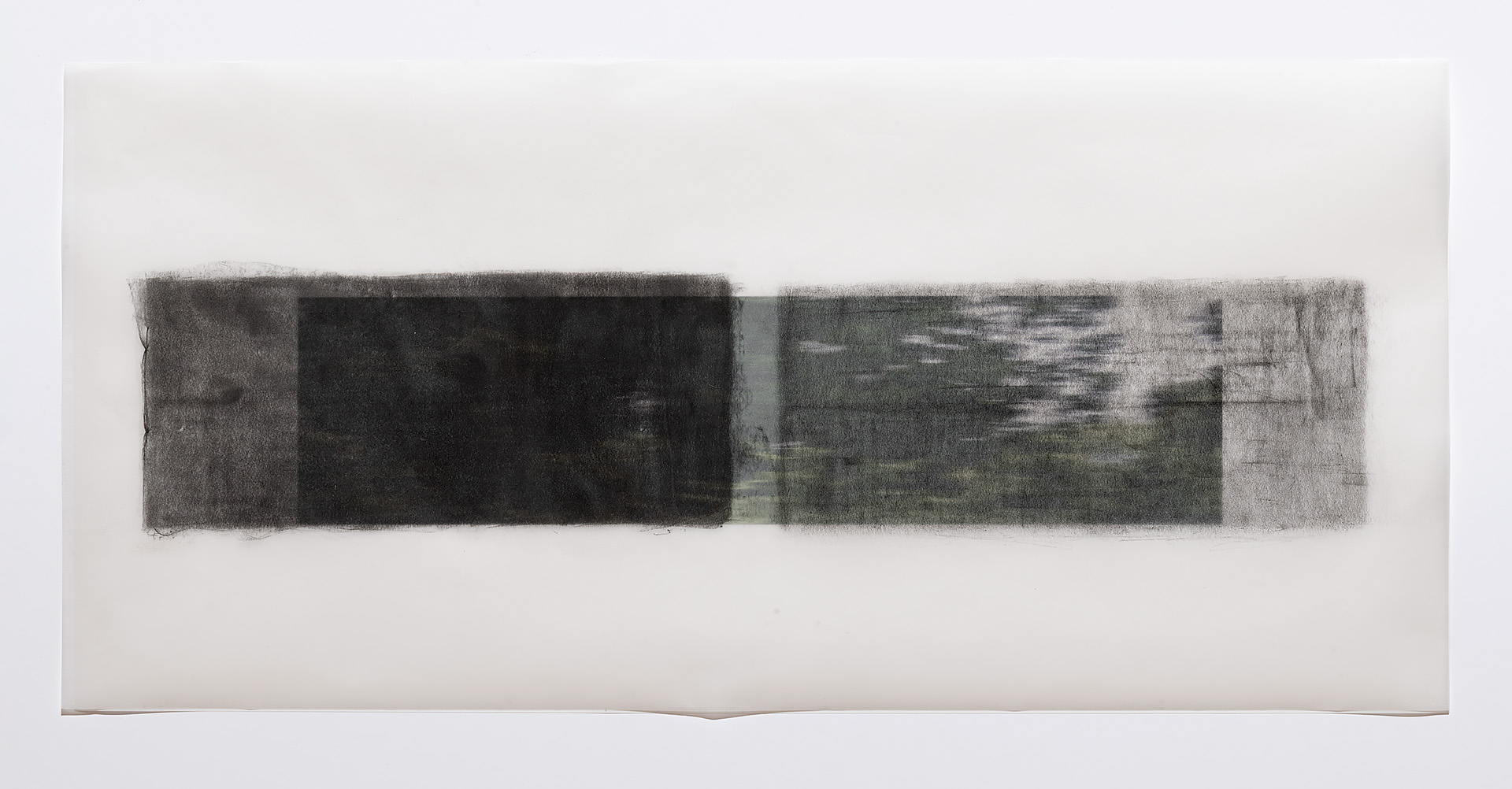 Horizontal graphite rubbings on translucent vellum creating overlapping rectangular forms that transition from deep black on the left to lighter gray tones on the right, mounted on white paper with soft, indistinct edges.