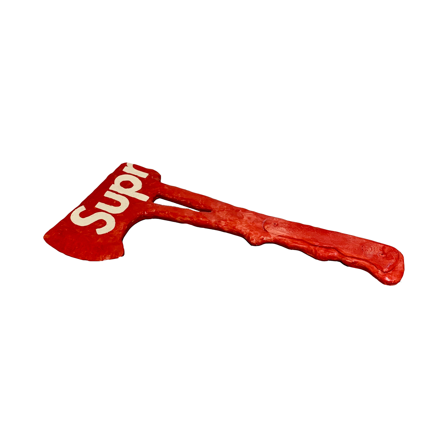 Red ceramic hatchet with cream-colored lettering on the blade, featuring a textured wooden handle rendered in glazed clay.