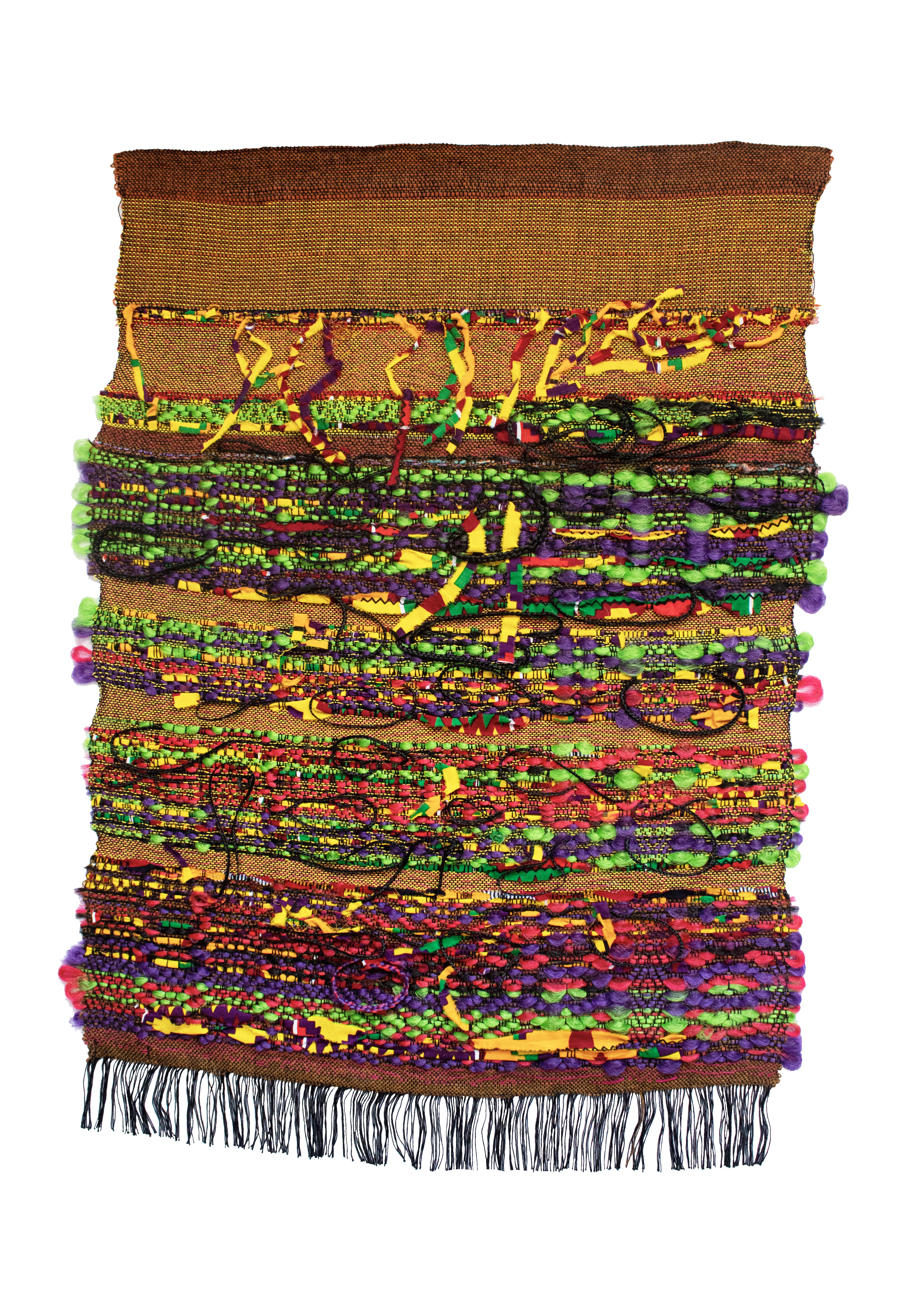 A densely layered woven textile hanging featuring vibrant horizontal stripes of contrasting colors—brilliant lime green, deep purple, rich reds, warm yellows, and earthy browns—interspersed with intricate patterned bands. Colorful pom-poms in matching hues edge the right side, while black fringe trims the bottom, creating a dynamic, energetic composition that emphasizes texture and chromatic richness.