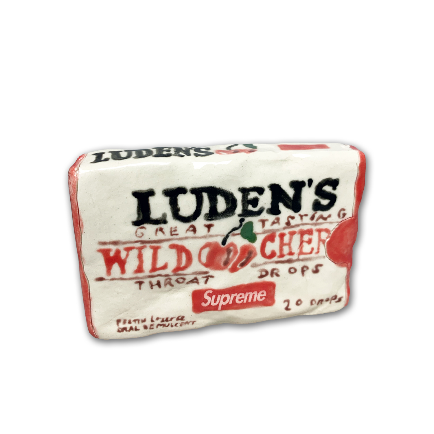 A ceramic cough drop box rendered in clay with glazed surface, featuring vintage packaging design with red and black typography on cream-colored ground. The work mimics a vintage Luden's Wild Cherry throat drops box, complete with period-accurate graphics and text details.