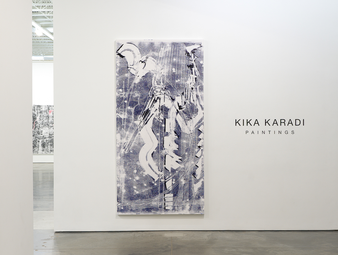 Large-scale monochromatic painting in shades of blue and white depicting an abstracted figural form with gestural marks, layered textures, and linear patterns created through stenciling and paint transfer techniques. The composition features dynamic, intersecting lines and organic shapes that create visual tension across the canvas surface.